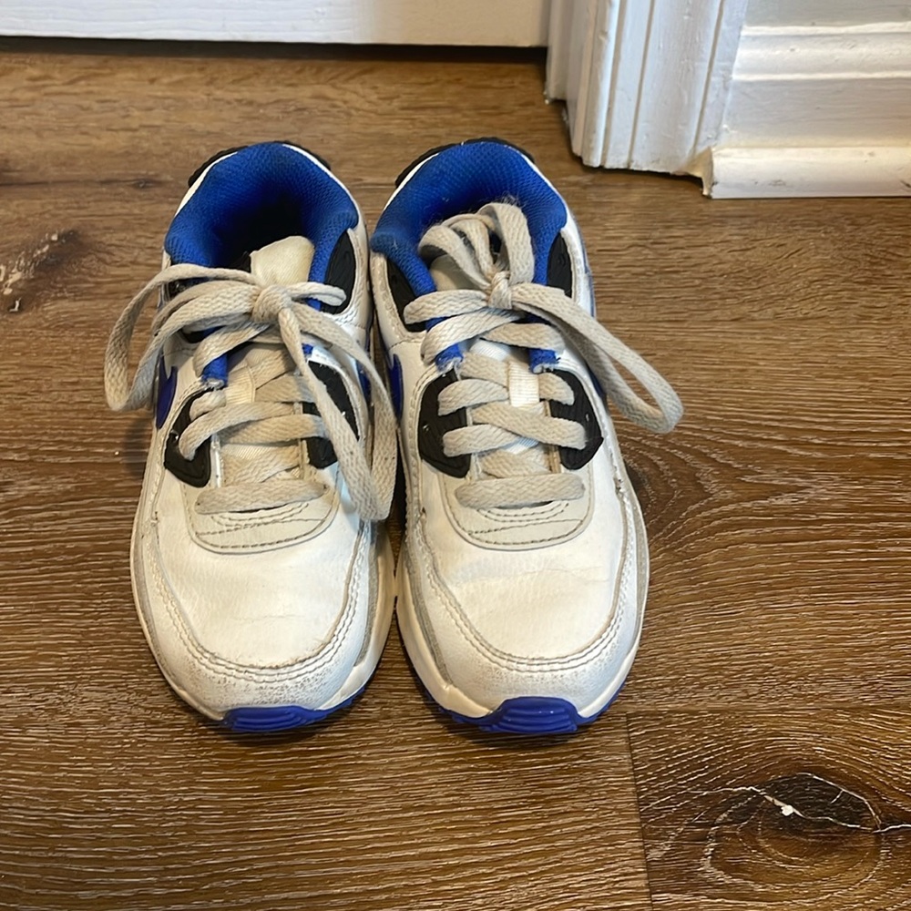 Little boy Nike sneakers.
